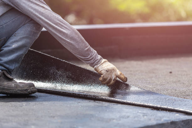 Professional Waterproofing technician working in Oakley, KS